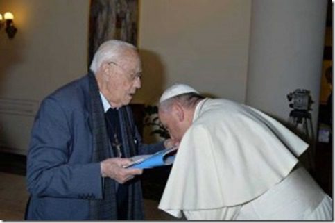 Speaking to the press, Francois bowed deeply to reverently kiss the hand of Michele De Paolis: priest and supporter of gay rights, after the pope concelebrated with him at home Santa Marta, in the Vatican.